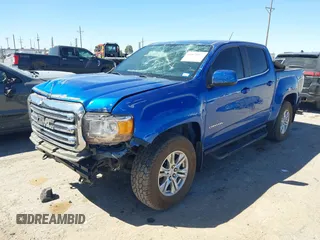2019 GMC Canyon 4WD SLE z VIN 1GTG6CENXK1222416, wystawiony jako IAAI lot #41878077 z przebiegiem 85 415 mil mil oraz . Historia ofert i sprzedaży dostępna na DreamBid. Obrazek 2.