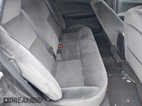 2014 Chevrolet Impala LS with VIN 2G1WA5E39E1136977, listed as a IAAI auction lot 41843947 with 122,709 mi miles and . Bid and sale history available at DreamBid. Image 8.
