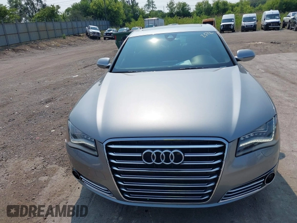 2013 Audi A8 4.0L with VIN WAUA2AFD5DN021950, listed as a IAAI auction lot 42472512 with 126,964 mi miles and . Bid and sale history available at DreamBid. Image 12.