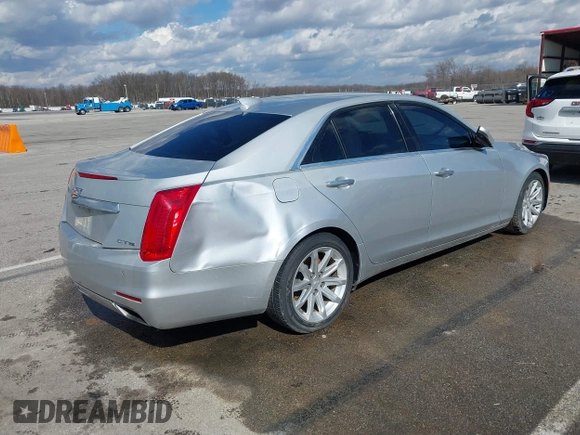 2015 Cadillac CTS RWD with VIN 1G6AP5SX5F0115745, listed as a IAAI auction lot 41658935 with 62,477 mi miles and . Bid and sale history available at DreamBid. Image 4.