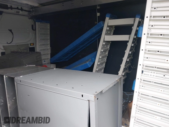 2016 Ford Transit Cargo z VIN 1FTYR1YM0GKB55345, wystawiony jako IAAI lot #40200213 z przebiegiem 121 480 mil mil oraz . Historia ofert i sprzedaży dostępna na DreamBid. Obrazek 8.