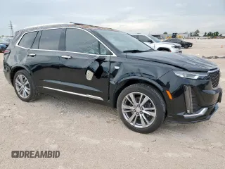 2024 Cadillac XT6 FWD Premium Luxury with VIN 1GYKPCRS7RZ709179, listed as a Copart auction lot 62374585 with 19,442 mi miles and Salvage title. Bid and sale history available at DreamBid. Image 4.