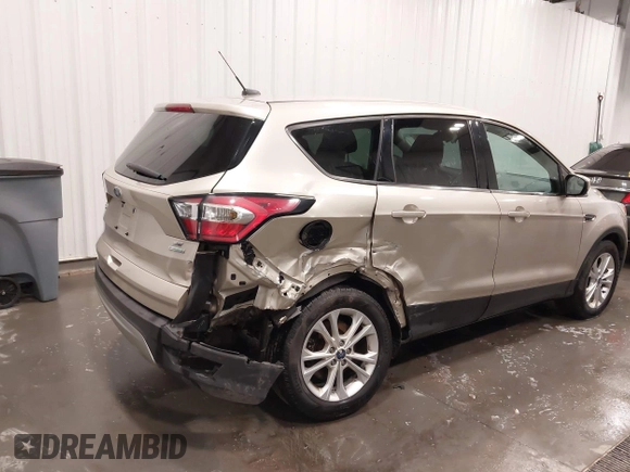 2017 Ford Escape SE z VIN 1FMCU0GD1HUE66952, wystawiony jako IAAI lot #41750959 z przebiegiem 86 442 mil mil oraz . Historia ofert i sprzedaży dostępna na DreamBid. Obrazek 6.