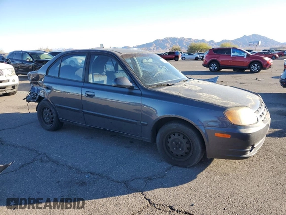 2005 Hyundai Accent GLS with VIN KMHCG45C95U665574, listed as a Copart auction lot 82603804 with 154,187 mi miles and Salvage Title. Bid and sale history available at carsss.com. Image 4.