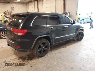 2011 Jeep Grand Cherokee Limited with VIN 1J4RR5GTXBC586647, listed as a IAAI auction lot 42332615 with 151,377 mi miles and . Bid and sale history available at DreamBid. Image 4.