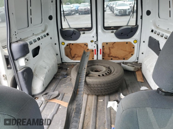 2010 Ford Transit Connect XLT with VIN NM0LS6BN1AT018703, listed as a Copart auction lot 56548575 with 184,017 mi miles and Salvage title. Bid and sale history available at DreamBid. Image 10.