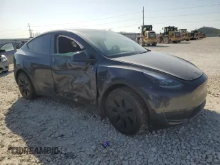 2025 Tesla Model Y Long Range z VIN 7SAYGDEE8SA338745, wystawiony jako Copart lot #50034495 z przebiegiem 4 829 mil mil oraz Szkoda całkowita • Salvage title. Historia ofert i sprzedaży dostępna na DreamBid. Obrazek 4.