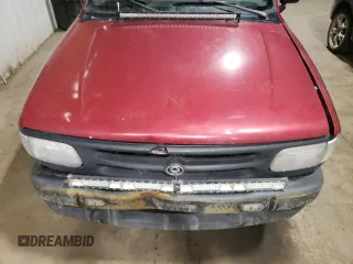 1996 Mazda B-Series Truck z VIN 4F4CR17U5TTM43191, wystawiony jako Copart lot #57178815 z przebiegiem 259 459 mil mil oraz Szkody całkowita. Historia ofert i sprzedaży dostępna na DreamBid. Obrazek 11.
