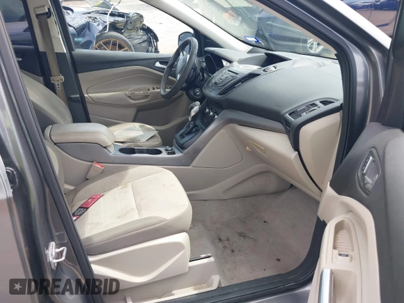 2014 Ford Escape SE z VIN 1FMCU9GX9EUC01478, wystawiony jako IAAI lot #42370409 z przebiegiem 158 154 mil mil oraz . Historia ofert i sprzedaży dostępna na DreamBid. Obrazek 5.