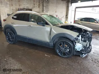 2024 Mazda CX-30 2.5 Carbon Turbo with VIN 3MVDMBXY5RM600986, listed as a IAAI auction lot 41179336 with 20,890 mi miles. Bid and sale history available at carsss.com. Image 1.