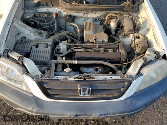 1999 Honda CR-V LX with VIN JHLRD1848XC027046, listed as a Copart auction lot 64091164 with 144,844 mi miles and Salvage Title. Bid and sale history available at carsss.com. Image 12.