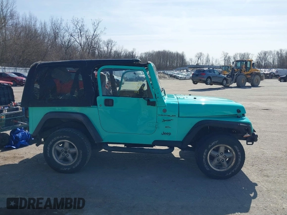 1997 Jeep Wrangler Sport with VIN 1J4FY19S2VP423426, listed as a IAAI auction lot 41734992 with 164,706 mi miles. Bid and sale history available at carsss.com. Image 13.