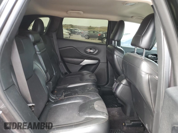 2018 Jeep Cherokee Latitude Plus with VIN 1C4PJMLX0JD562180, listed as a Copart auction lot 57631285 with 105,923 mi miles and Salvage title. Bid and sale history available at DreamBid. Image 10.