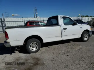 2001 Ford F-150 XL z VIN 3FTZF17211MA71306, wystawiony jako Copart lot #57824475 z przebiegiem 186 866 mil mil oraz Szkoda całkowita • Salvage title. Historia ofert i sprzedaży dostępna na DreamBid. Obrazek 3.