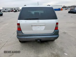 1999 Mercedes-Benz M 320/430/500 with VIN 4JGAB54E8XA060898, listed as a Copart auction lot 46033325 with Not provided miles and Salvage title. Bid and sale history available at DreamBid. Image 6.