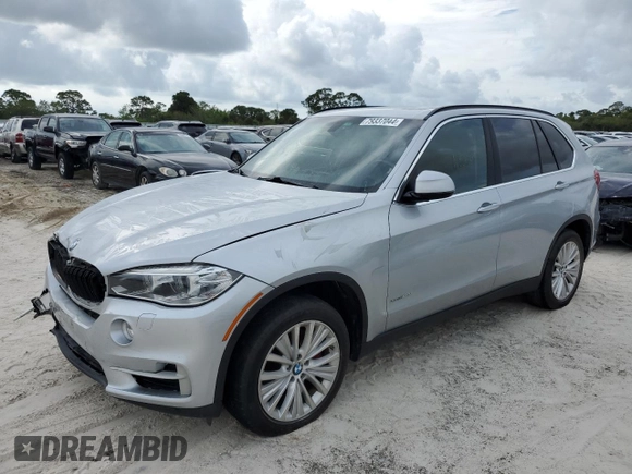 2015 BMW X5 xDrive50i with VIN 5UXKR6C51F0J74160, listed as a Copart auction lot 79337044 with 143,436 mi miles and Salvage title. Bid and sale history available at DreamBid. Image 1.