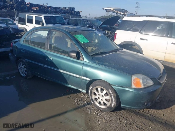2003 Kia Rio with VIN KNADC125836238197, listed as a IAAI auction lot 41781730 with 138,384 mi miles. Bid and sale history available at carsss.com. Image 1.