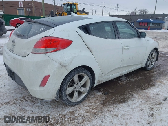 2013 Hyundai Veloster w/Black Int with VIN KMHTC6AD9DU171722, listed as a IAAI auction lot 41617721 with 115,791 mi miles and . Bid and sale history available at DreamBid. Image 4.