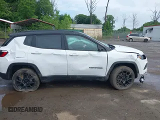 2023 Jeep Compass Latitude with VIN 3C4NJDBN3PT510424, listed as a IAAI auction lot 42385491 with 58,640 mi miles and . Bid and sale history available at DreamBid. Image 13.
