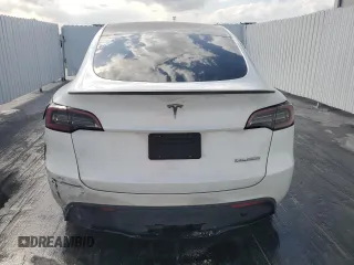 2023 Tesla Model Y Performance with VIN 7SAYGDEF8PF595178, listed as a Copart auction lot 46496995 with 39,057 mi miles and Non Repairable. Bid and sale history available at DreamBid. Image 6.