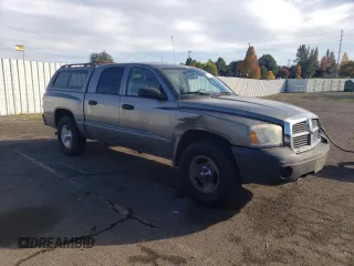 2006 Dodge Dakota ST with VIN 1D7HW28K96S716210, listed as a Copart auction lot 77416344 with 115,973 mi miles and Salvage Title. Bid and sale history available at DreamBid. Image 4.