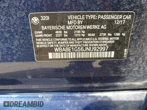 2018 BMW 3 Series 320i with VIN WBA8E1G56JNU92997, listed as a IAAI auction lot 42039869 with 105,085 mi miles. Bid and sale history available at carsss.com. Image 9.