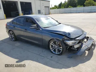 2012 BMW 3 Series 335i with VIN WBA3A9C5XCF474803, listed as a Copart auction lot 57940675 with 121,960 mi miles and Salvage title. Bid and sale history available at DreamBid. Image 4.