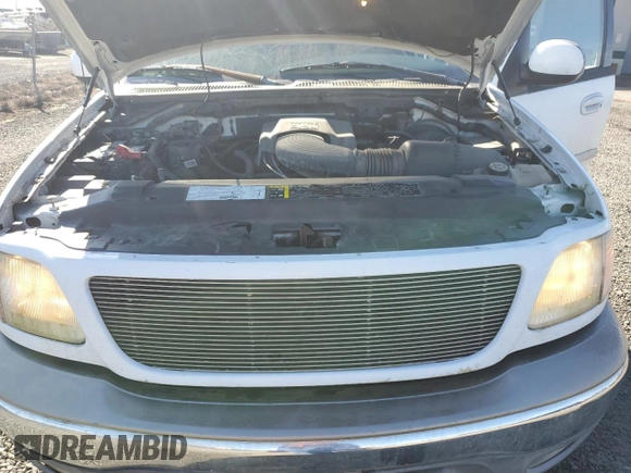 2003 Ford F-150 XLT with VIN 1FTRW08LX3KD26384, listed as a Copart auction lot 46612295 with 0 mi miles and Salvage Title. Bid and sale history available at carsss.com. Image 12.