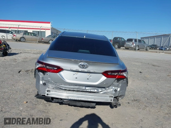 2021 Toyota Camry SE Nightshade with VIN 4T1G11AK1MU529646, listed as a IAAI auction lot 41650962 with 57,879 mi miles. Bid and sale history available at carsss.com. Image 6.