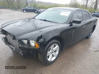 2014 Dodge Charger SE with VIN 2C3CDXBG6EH241332, listed as a IAAI auction lot 41962143 with 152,649 mi miles and . Bid and sale history available at carsss.com. Image 2.