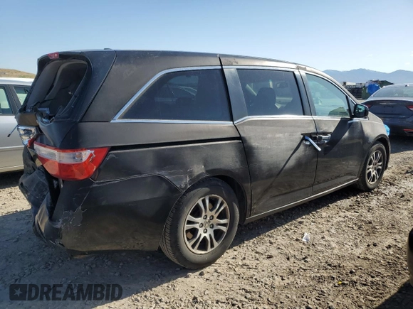 2012 Honda Odyssey EX-L with VIN 5FNRL5H69CB141594, listed as a Copart auction lot 55422115 with 181,745 mi miles and Salvage Title. Bid and sale history available at DreamBid. Image 3.
