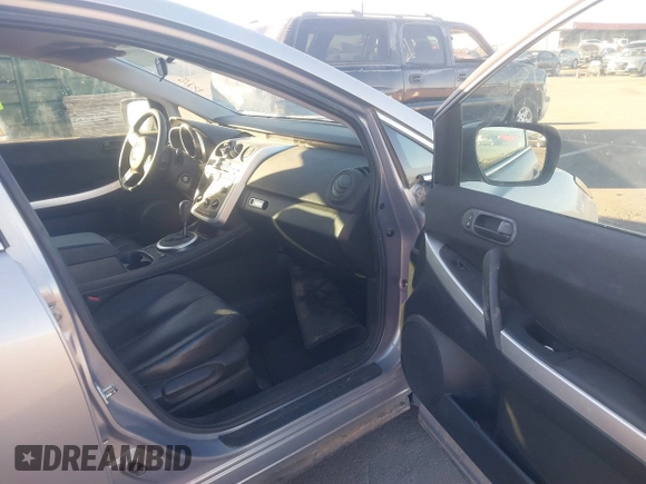 2009 Mazda CX-7 Sport with VIN JM3ER293190233927, listed as a IAAI auction lot 41054654 with 103,137 mi miles. Bid and sale history available at carsss.com. Image 5.