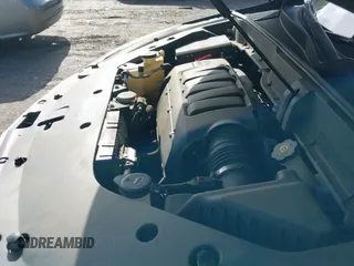 2013 Chevrolet Traverse LT z VIN 1GNKRGKDXDJ106308, wystawiony jako IAAI lot #42617918 z przebiegiem 80 823 mil mil oraz . Historia ofert i sprzedaży dostępna na DreamBid. Obrazek 12.