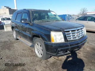 2006 Cadillac Escalade z VIN 1GYEK63NX6R110465, wystawiony jako IAAI lot #41268338 z przebiegiem 202 042 mil mil oraz . Historia ofert i sprzedaży dostępna na DreamBid. Obrazek 1.