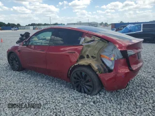 2024 Tesla Model Y Performance with VIN 7SAYGDEF1RF052175, listed as a Copart auction lot 51743895 with 4,869 mi miles and Salvage Title. Bid and sale history available at DreamBid. Image 2.