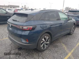 2023 Volkswagen ID.4 Pro z VIN 1V2CMPE88PC028158, wystawiony jako IAAI lot #41538391 z przebiegiem 7159 mil mil oraz . Historia ofert i sprzedaży dostępna na DreamBid. Obrazek 4.