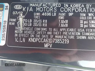 2013 Kia Sportage SX with VIN KNDPCCA61D7385219, listed as a IAAI auction lot 41945345 with 112,471 mi miles and . Bid and sale history available at carsss.com. Image 9.