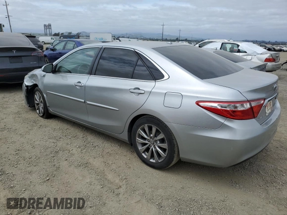 2015 Toyota Camry LE with VIN 4T1BD1FKXFU151730, listed as a Copart auction lot 54393225 with 219,892 mi miles and Salvage title. Bid and sale history available at DreamBid. Image 2.