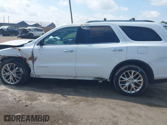 2014 Dodge Durango Citadel z VIN 1C4RDJEG9EC455930, wystawiony jako IAAI lot #42423167 z przebiegiem Nie podano mil oraz . Historia ofert i sprzedaży dostępna na DreamBid. Obrazek 13.
