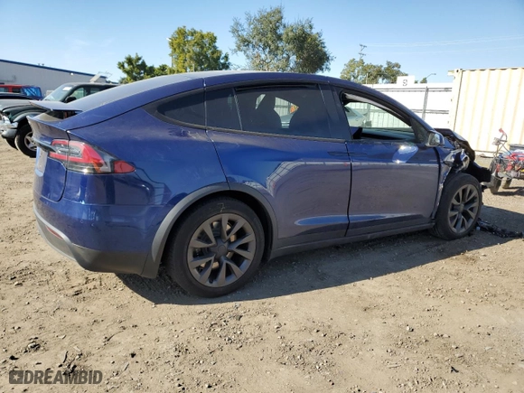 2022 Tesla Model X with VIN 7SAXCBE52NF327145, listed as a Copart auction lot 38304243 with 0 miles. Bid and sale history available at carsss.com. Image 3.