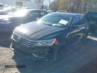2016 Volkswagen Passat SE with VIN 1VWBT7A30GC049027, listed as a IAAI auction lot 41878460 with 125,261 mi miles and . Bid and sale history available at DreamBid. Image 17.