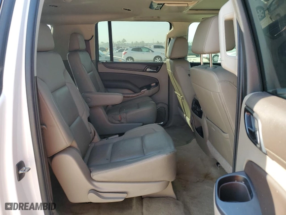 2017 Chevrolet Suburban Premier with VIN 1GNSCJKC7HR128988, listed as a Copart auction lot 73958784 with 121,662 mi miles and Salvage Title. Bid and sale history available at carsss.com. Image 11.