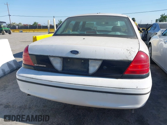 2000 Ford Crown Victoria Police Interceptor z VIN 2FAFP71W7YX104263, wystawiony jako IAAI lot #42442496 z przebiegiem 153 064 mil mil oraz . Historia ofert i sprzedaży dostępna na DreamBid. Obrazek 16.