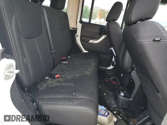 2013 Jeep Wrangler Unlimited Sahara with VIN 1C4HJWEG1DL516784, listed as a Copart auction lot 56382805 with 205,874 mi miles and Salvage title. Bid and sale history available at DreamBid. Image 11.
