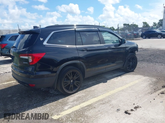 2022 Honda Pilot Special Edition with VIN 5FNYF5H21NB011652, listed as a IAAI auction lot 42772962 with 69,046 mi miles and . Bid and sale history available at DreamBid. Image 4.