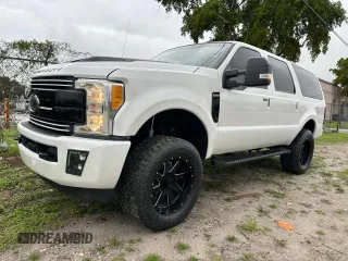 2004 Ford Excursion Limited with VIN 1FMSU43P44EA90772, listed as a Copart auction lot 75058414 with 173,925 mi miles and Clean Title. Bid and sale history available at DreamBid. Image 1.