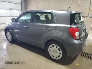 2014 Scion xD z VIN JTKKUPB4XE1041963, wystawiony jako Copart lot #88679835 z przebiegiem 80 320 mil mil oraz Szkoda całkowita • Salvage title. Historia ofert i sprzedaży dostępna na DreamBid. Obrazek 2.