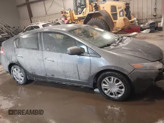 2011 Honda Insight with VIN JHMZE2H37BS004281, listed as a IAAI auction lot 41636305 with 273,063 mi miles and . Bid and sale history available at DreamBid. Image 14.