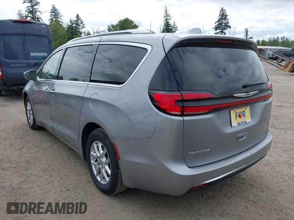 2021 Chrysler Pacifica Touring L with VIN 2C4RC1BG3MR552828, listed as a IAAI auction lot 42207838 with 67,917 mi miles and . Bid and sale history available at DreamBid. Image 3.