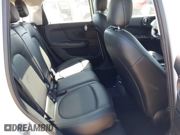 2018 MINI Countryman Cooper with VIN WMZYV5C37J3E03421, listed as a IAAI auction lot 42238016 with 93,810 mi miles and . Bid and sale history available at DreamBid. Image 8.